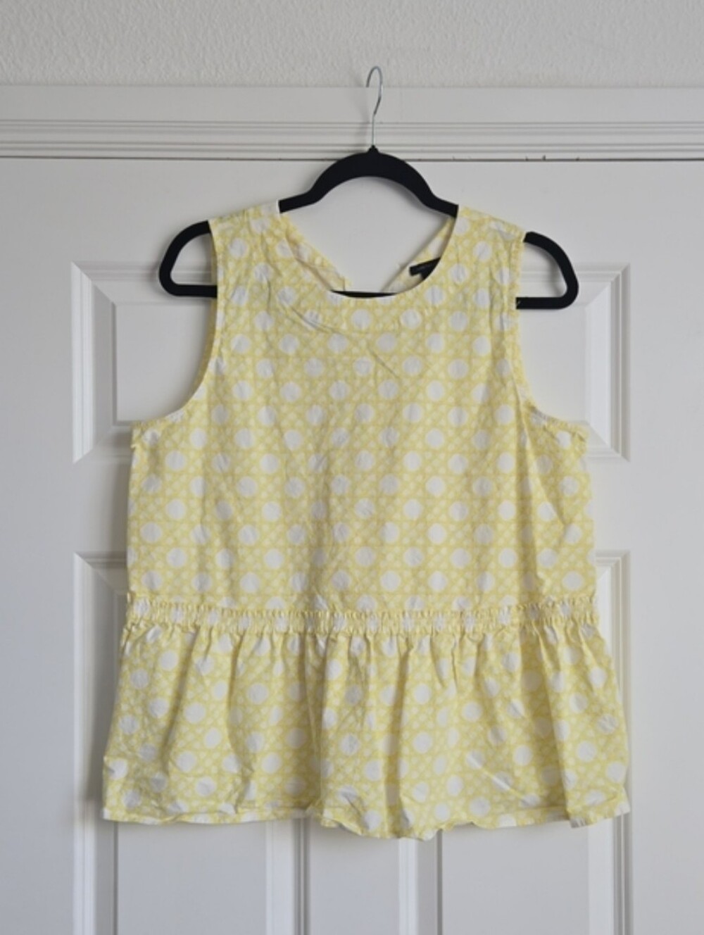 Yellow Patterned Peplum Sleeveless Top